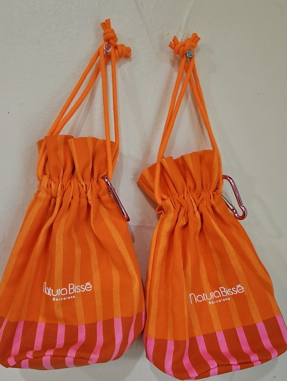 Set 2 Natura Bissé Orange Drawstring Pouch with Pink Stripe Cream Set
